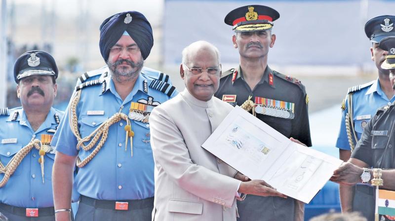 President Ram Nath Kovind presenting the Nishanth award, known as the Presidential colours, at Sulur air base on Monday. Chief Air Marshal BS Dhanoa  and other higher Army officials seen. (Photo: DC)