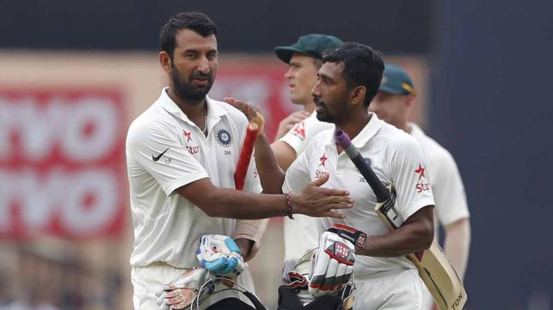 Cheteshwar Pujara (202) and Wriddhiman Saha (117) steered India to 603 for nine against Australia and gave the team a substantial 152-run lead. (Photo: BCCI)