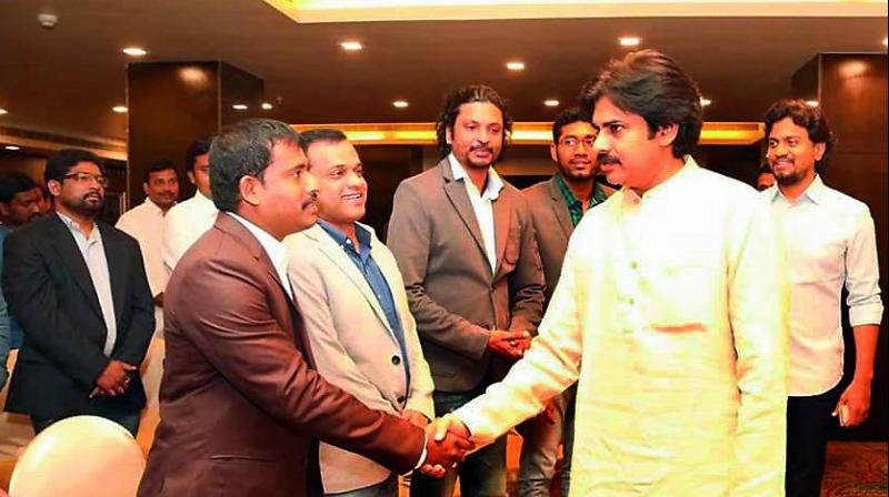 Jana Sena chief Pawan Kalyan meets NRIs at a hotel in Vijayawada on Thursday. (Photo: DC)