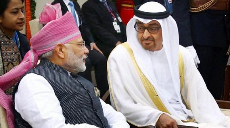 Prime Minister Narendra Modi and the Chief Guest Crown Prince of Abu Dhabi General Sheikh Mohammed Bin Zayed Al Nahyan at saluting dais during the 68th Republic Day Parade at Rajpath in New Delhi on Thursday. (Photo: PTI)