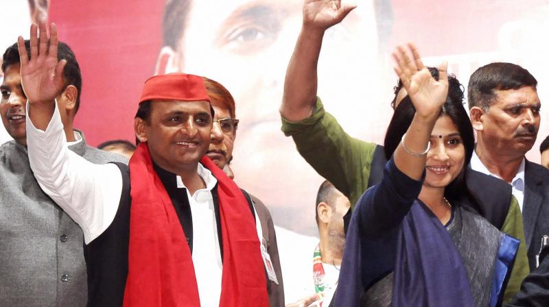 Uttar Pradesh Chief Minister Akhilesh Yadav and SP MP and wife Dimple Yadav at an election rally in Lucknow. (Photo: PTI)