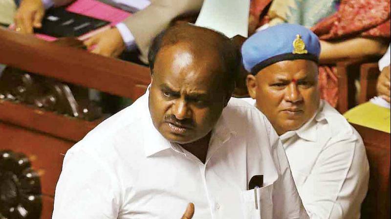 CM H.D. Kumaraswamy and Opposition leader B.S. Yeddyurappa argue during the session in Bengaluru on Monday (Photo: DC)