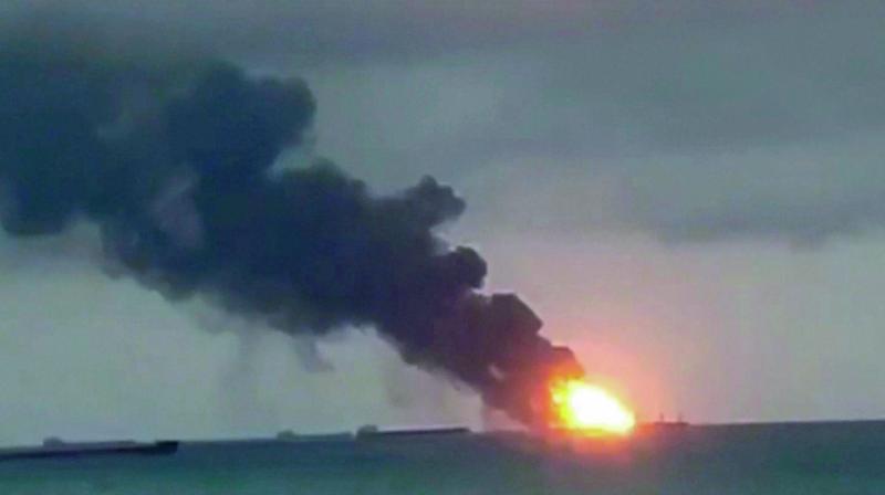 A video grab by the Kerch.fm web portal shows the two vessels, the Maestro and the Candiy, on fire near the Kerch Strait linking the Black Sea and the Sea of Azov, in Kerch, Crimea, on Monday. (Photo:  AP)