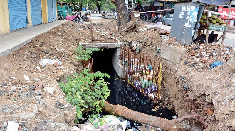 Trenches dug up for storm water drainage posing threats to public and motorists in Ayanavaram. (Photo:DC)