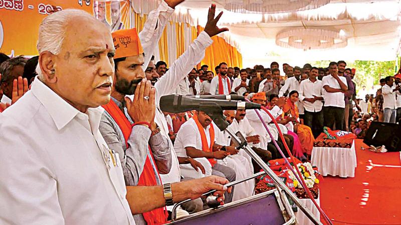 State BJP president B.S. Yeddyurappa campaigns for party candidate C.T. Ravi at Sakharayapatna in Chikkamagaluru district on Thursday.