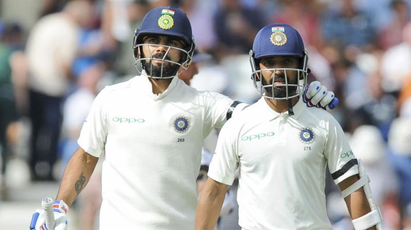 Virat Kohli and Ajinkya Rahane will look to deny Australia any more success after Australia managed to scalp three wickets on Day two of the second Test. (Photo: AP)