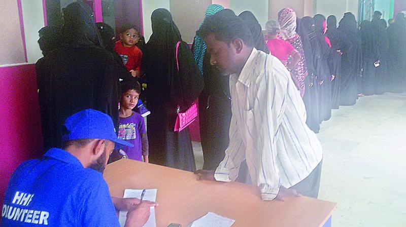 Scores of women waiting outside the consulting room of the Community Centre in Barkas.  (Photo:DC)