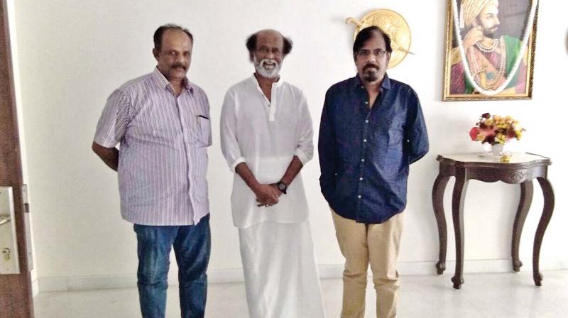 Film Employees Federation of South India (Fefsi) president R. K. Selvamani meets actor Rajinikanth at the  latters residence on Wednesday. 	(Photo:DC)