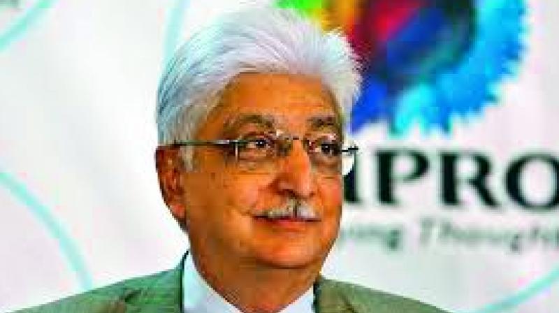Premji says left college early due to fathers death.
