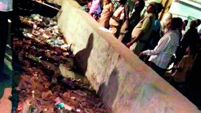Garbage covers the drain in Rein Bazaar, where a two-year-old fell and drowned on Saturday.