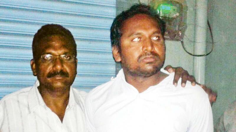 Madhukar Reddy in  police custody 	(Photo: KPN)