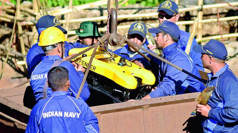 Navy personnel conduct rescue task at the site of the coal mine collapse at Ksan, in Jaintia Hills district of Meghalaya, Monday. (Photo: AP)