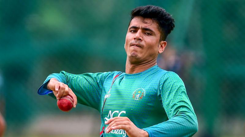 The mystery over Afghanistan cricketer Mujeeb Ur Rahmans age seems to have been cleared after Asif Khan, the editor of The Dawn apologised for his mistake, saying that he meant Najeeb and not Mujeeb. (Photo: PTI)