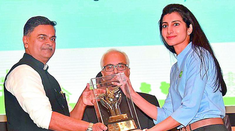 Heritage Foods executive director Nara Brahmani receiving the National Energy Conservation Award-2017 from Union minister of state for power and renewable energy Raj Kumar Singh in New Delhi on Thursday.