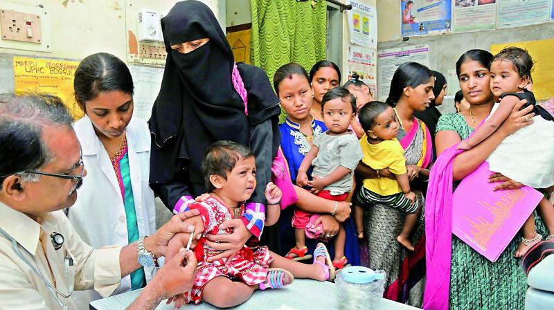 A child is given a vaccine at the Boggula PHC. (Photo: DC)