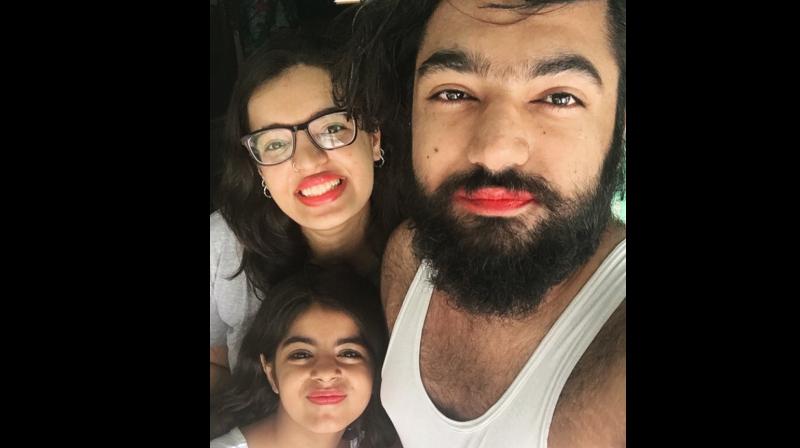 This family wore red lipstick to support their effeminate 9-yr-old cousin