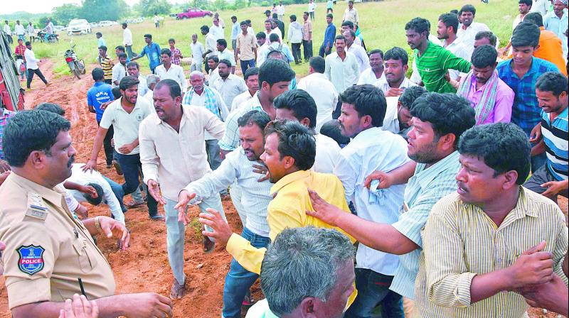 Agitated villagers protest at the public hearing meet for Pharma City, which was  held at Medipally village near Ibrahimpatnam on Wednesday.   (Photo: Deepak Deshpande)