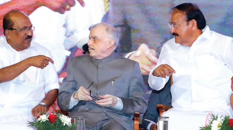 Vice-president Venkaiah Naidu chats with Governor P Sathasivam and K.V. Thomas, MP, at the inauguration of platinum jubilee celebration of SH College in Kochi on Friday.	(ARUN CHANDRABOSE)