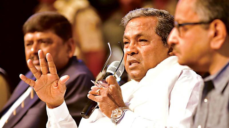 Chief Minister Siddaramaiah interacts with probationary officers at the Administrative Training Institute in Mysuru on Thursday. (Photo: DC)