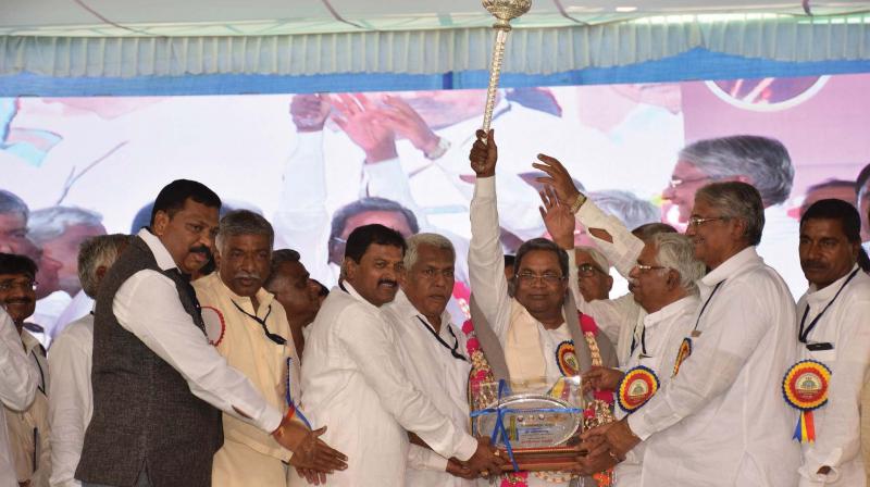 Chief Minister Siddaramaiah at a function to inaugurate the centenary celebrations of KCC Bank in Dharwad on Saturday 	 KPN
