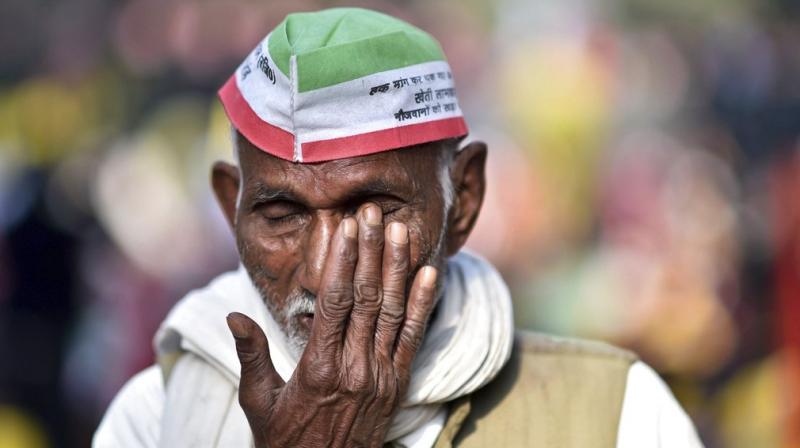 Dubbed as the largest farmers protest and congregation in New Delhi, around 35,000 farmers, from across the country, converged at the Parliament Street police station on November 29 after their march was stopped by the administration. (Photo: PTI)