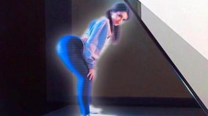 A Japanese company has even created a hologram wife that does everything a real wife would do. (Photo: Youtube)