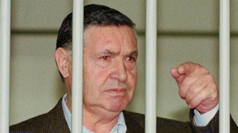 In this April 29, 1993 photo, Mafia \boss of bosses\ Salvatore \Toto\ Riina, is seen behind bars, during a trial in Rome. (Photo: AP)