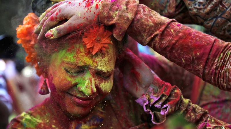 People of Mahant (Preist) community go to the villages celebrating Holi till the actual date. (Photo: AP)