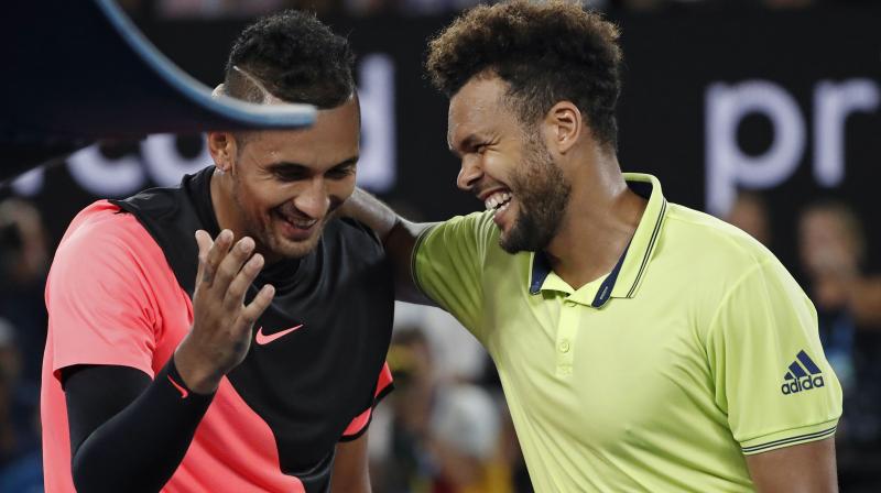 Away from his favoured Hisense Arena where he draws energy from the raucous atmosphere, the 17th seed reined supreme in the tiebreaks, downing former finalist Tsonga 7-6(5) 4-6 7-6(6) 7-6(5) on the floodlit centre court. (Photo: AP)