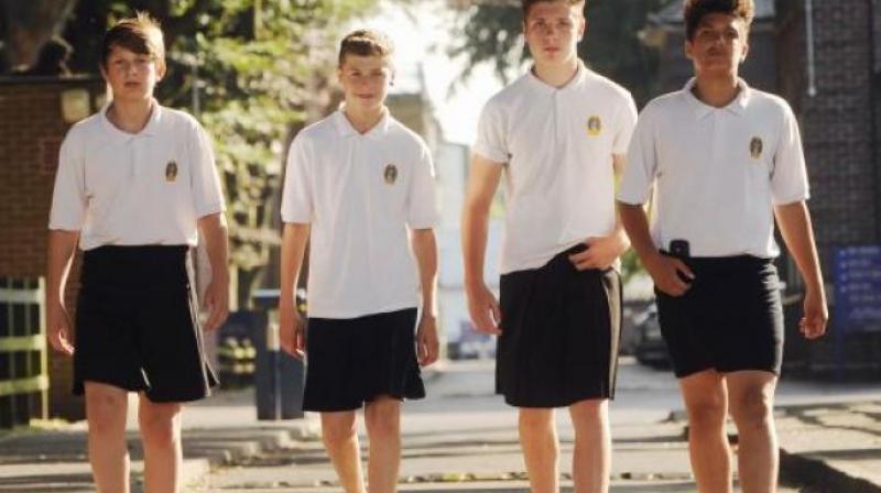 Headteacher Aimee Mitchell said they are considering revising the school uniform policy as the heatwave continues to beat down on Britain. (Photo: AP)