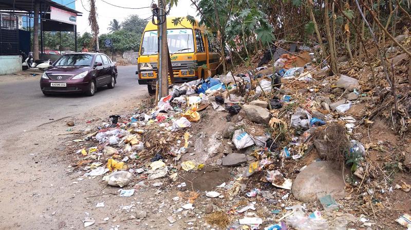 Garbage dumped at JHBCS Layout near Kadirenahalli Cross in Bengaluru 	(Photo: DC)