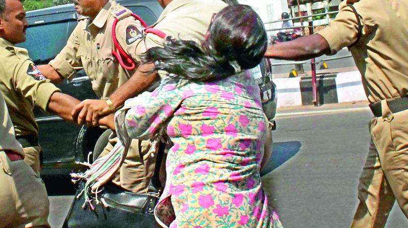 A woman being brutally dragged by cops during a protest demonstration in Hyderabad.