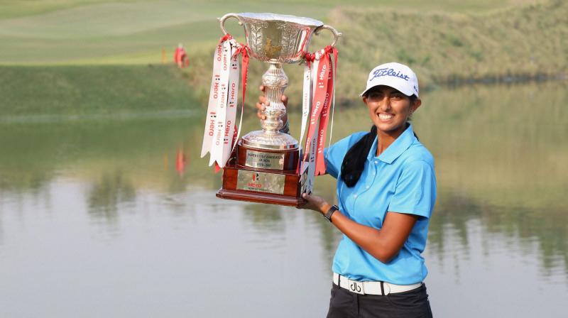 Aditi Ashok poses after receiving the Hero Womens Indian Open Golf trophy in Gurugram on Sunday (Photo: AP)