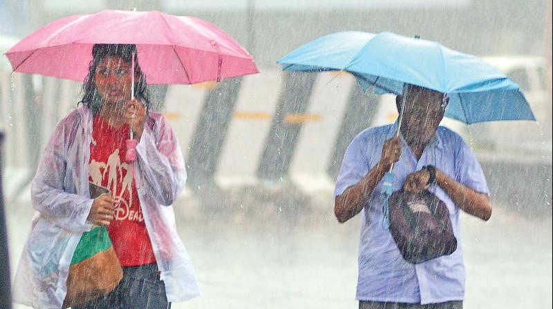 Early morning spells at Chennai caught people unawares on Sunday. (Photo: DC)