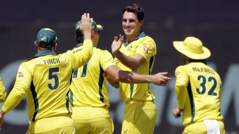 Later Indian bowlers, especially Jasprit Bumrah and Vijay Shankar held their nerves in the death overs to limit Australia to 242. (Photo: AP)