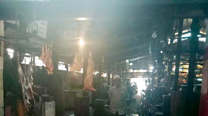 Meat stalls in Russel Market (above); Garbage with waste meat dumped on road near Shivajinagar meat market.
