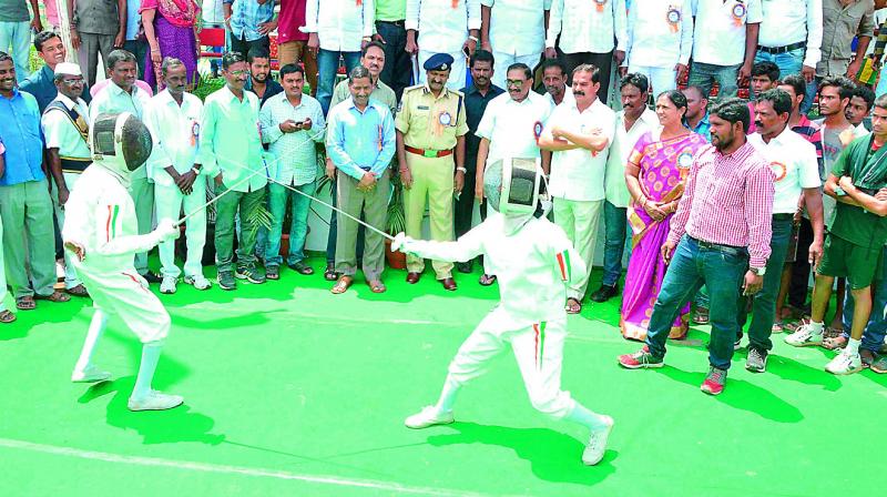 Students fence after inauguration of sports festival in Hanamkonda on Wednesday. (Photo: DC)