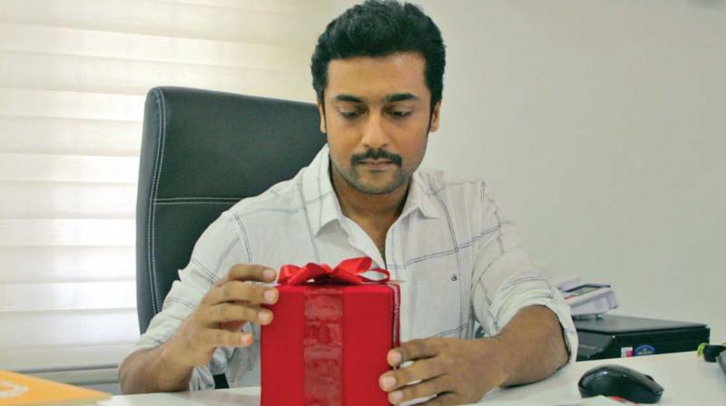 Suriya in the Gift Song, which was used as the promo for the film Koottathil Orutthan.