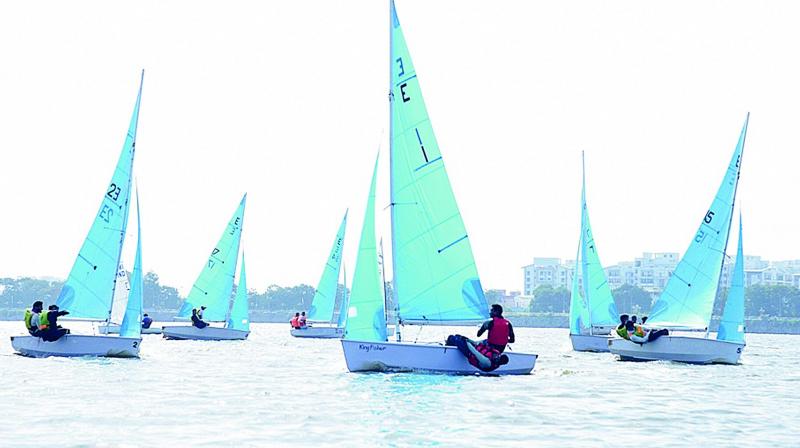 Ashish Patel and Nagen Behra in action in the Enterprise Class race of the Hyderabad Sailing week at Hussainsagar lake on Wednesday.