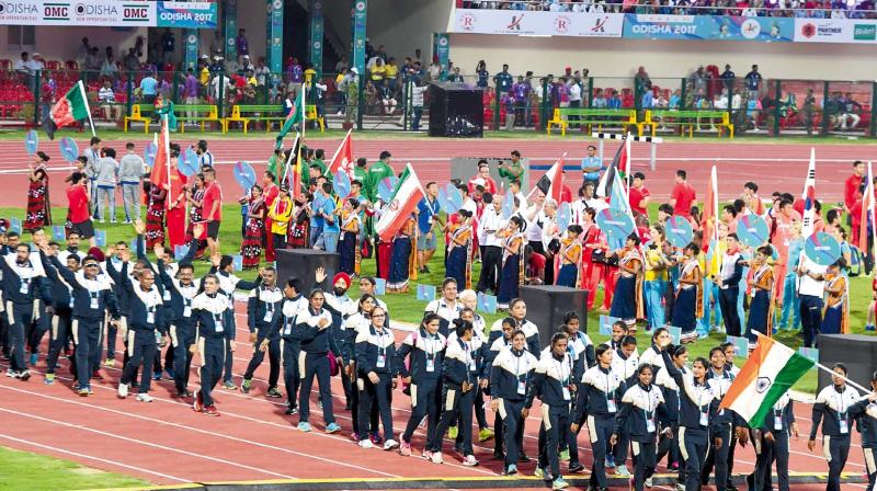 The Indian contingent marches in the opening ceremony of the 22nd Asian Athletics Championships at the Kalinga Stadium in Bhubaneswar on Wednesday (Photo: AFP)