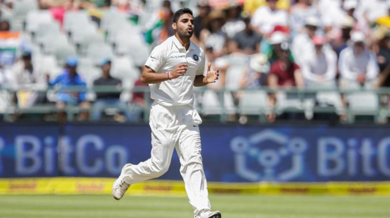 Bhuvneshwar Kumar finished with figures of 4 for 87 but missed out on a five-for as Shikhar Dhawan dropped Keshav Maharaj (then on nought) at slip. But the seamer is not at all disappointed. (Photo: AFP)