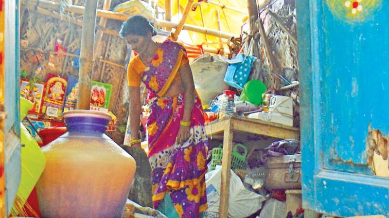 A woman at her house in VOC Nagar in RK Nagar constituency in Chennai. The house lacks even basic facilities like toilet. (Photo: E.K. Sanjay)
