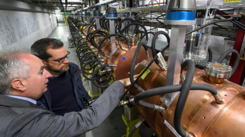 Europes top physics lab CERN has launched a new particle accelerator to connect to its Large Hadron Collider proton smasher, in an attempt to uncover new particles and prove the existence of extra space-time dimensions (Photo: AFP)
