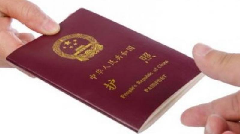 In mid-October, the public security bureau of Shihezi city posted a directive on a verified social media account asking residents to hand in their passports to police. (Photo: Representational Image/AFP)