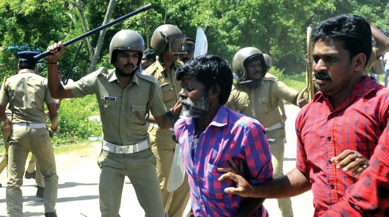 Police takes on agitators who protest against LPG Terminal at Puthuvypeen on Sunday.