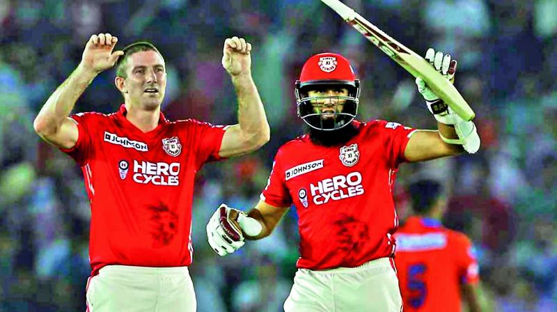 Shaun Marsh (left) and centurion Hashim Amla shared a 125-run partnership for the second wicket against Gujarat Lions.(Photo: BCCI)