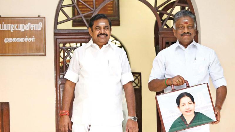 Deputy Chief Minister O. Panneerselvam and Chief Minister Edappadi K. Palaniswami before presenting the budget in the assembly, on Thursday.