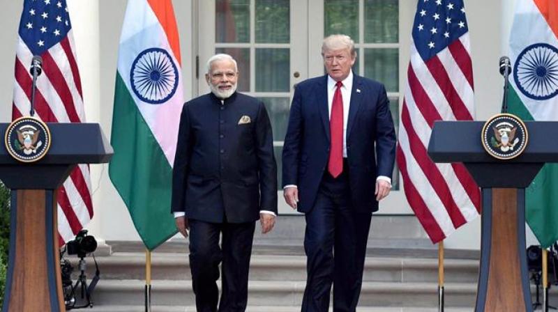 US President Donald Trump will attend the World Economic Forum in Davos later this month, opening up a distinct possibility of a meeting with Prime Minister Narendra Modi. (Photo: File | PTI)