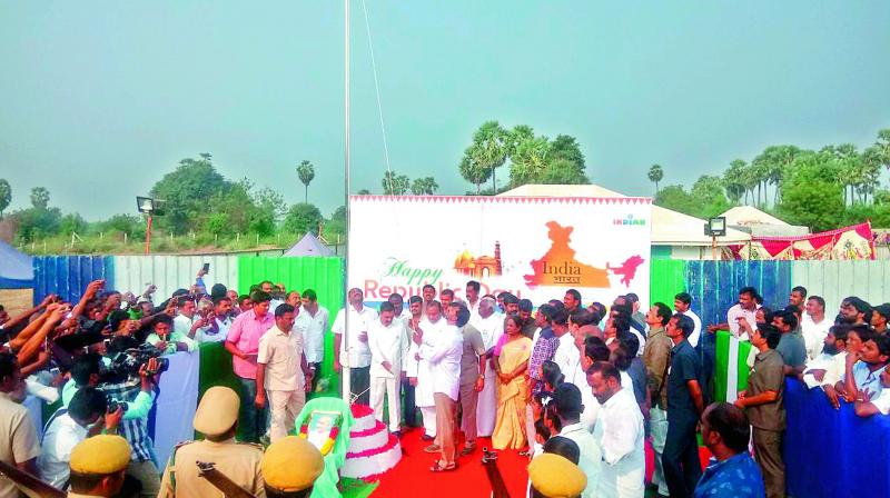 YSR Congress chief Jagan Mohan Reddy hoists the National Flag at Saguturu village in Ozili mandal of SPSR Nellore district on Friday on the occasion of Republic Day. (Photo: DC)