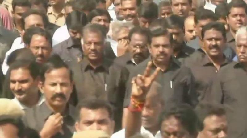Top AIADMK leaders K Palaniswami and O Pannnerselvam leading the party men in paying tributes to late chief minister of Tamil Nadu J Jayalalithaa. (Photo: ANI)